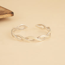 Load image into Gallery viewer, Silver open kada bracelet on a beige background