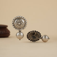 Load image into Gallery viewer, Side view of large sterling silver studs showing detailed dana art and post fastening