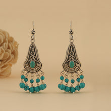 Load image into Gallery viewer, Oxidised silver earrings with intricate detailing and hanging turquoise beads